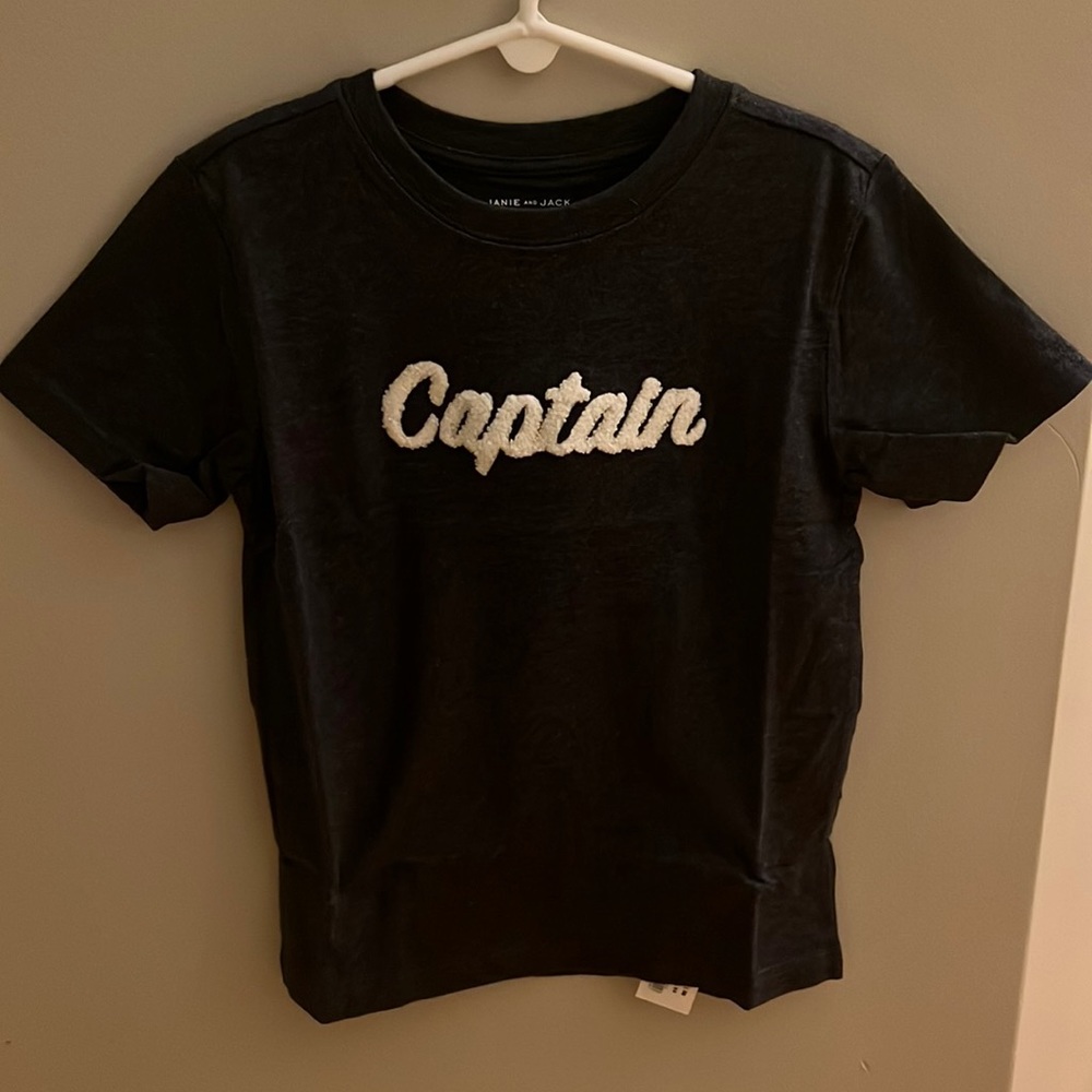 Navy never worn T-shirt with Captain terry clothe detail. Soft knit material.